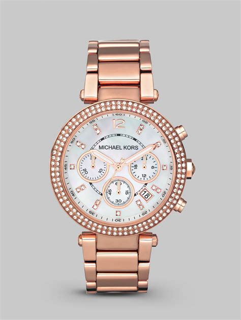 Michael Kors Women's Mother of Pearl Watches .